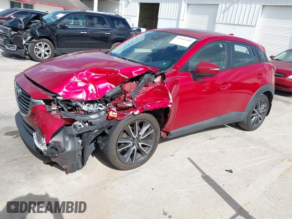 2018 Mazda CX-3 Touring with VIN JM1DKDC7XJ0318219, listed as a IAAI auction lot 41941104 with 86,186 mi miles. Bid and sale history available at carsss.com. Image 17.