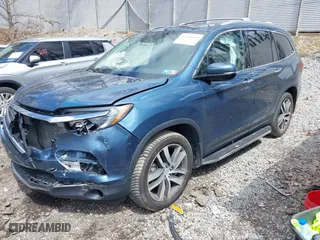2017 Honda Pilot Touring with VIN 5FNYF6H93HB017623, listed as a IAAI auction lot 41996650 with 97,946 mi miles. Bid and sale history available at carsss.com. Image 2.