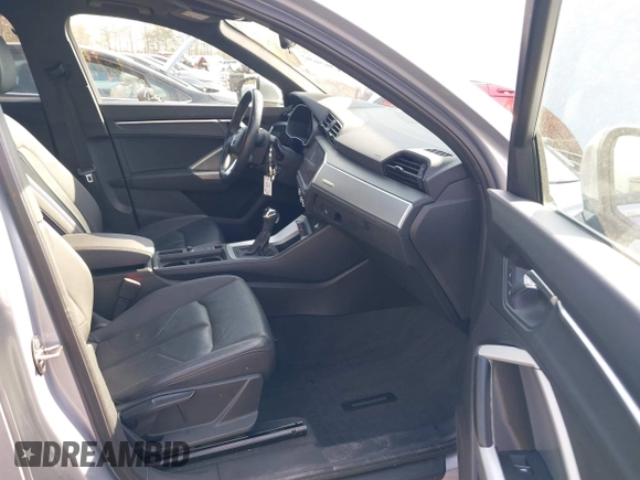 2019 Audi Q3 Premium with VIN WA1AECF32K1078022, listed as a IAAI auction lot 41365692 with 60,756 mi miles and . Bid and sale history available at DreamBid. Image 5.