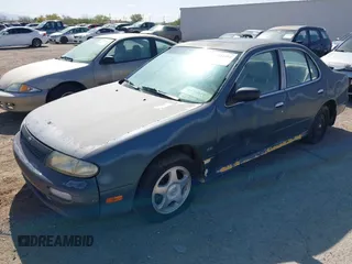 1994 Nissan Altima XE with VIN 1N4BU31D7RC140404, listed as a IAAI auction lot 41934492 with 160,073 mi miles and . Bid and sale history available at DreamBid. Image 2.