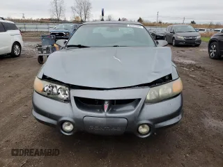 2004 Pontiac Bonneville SLE z VIN 1G2HY52K24U164098, wystawiony jako Copart lot #82283344 z przebiegiem 132 456 mil mil oraz Szkoda całkowita • Salvage title. Historia ofert i sprzedaży dostępna na DreamBid. Obrazek 5.
