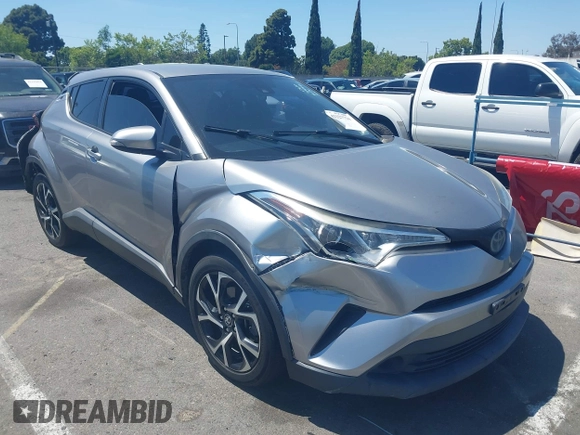 2018 Toyota C-HR XLE z VIN NMTKHMBX2JR057798, wystawiony jako IAAI lot #42327724 z przebiegiem 115 715 mil mil oraz . Historia ofert i sprzedaży dostępna na DreamBid. Obrazek 1.