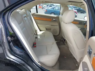 2008 Lincoln MKZ with VIN 3LNHM28T68R608324, listed as a IAAI auction lot 42085430 with 113,896 mi miles. Bid and sale history available at carsss.com. Image 8.