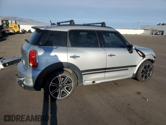 2015 MINI Countryman John Cooper Works with VIN WMWXD1C53FWS34815, listed as a Copart auction lot 74667224 with 94,971 mi miles and Salvage Title. Bid and sale history available at DreamBid. Image 3.