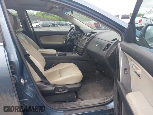 2014 Mazda CX-9 Touring with VIN JM3TB3CV1E0447130, listed as a IAAI auction lot 40815387 with 148,985 mi miles. Bid and sale history available at carsss.com. Image 5.