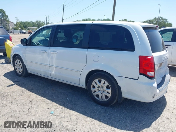 2014 Dodge Grand Caravan American Value with VIN 2C4RDGBG5ER187005, listed as a IAAI auction lot 42018333 with 216,149 mi miles and . Bid and sale history available at DreamBid. Image 3.