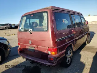 2003 Volkswagen EuroVan MV с VIN WV2NB47013H001081, выставлен на аукционе Copart как лот 82126354 с пробегом 158 433 миль миль и Чистый • Clean title. История ставок и продаж доступна на DreamBid. Изображение 3.
