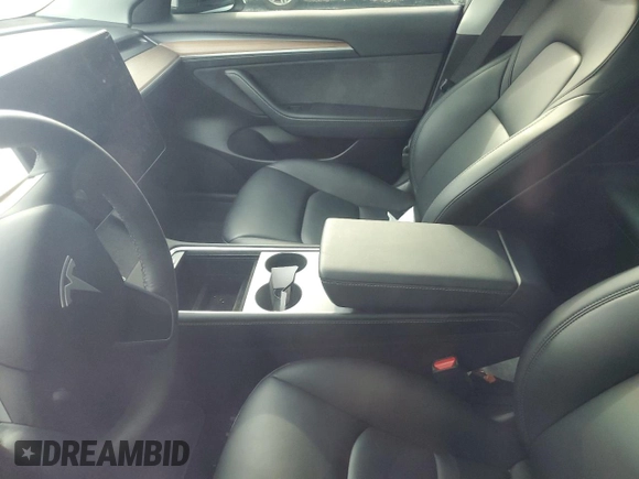 2023 Tesla Model 3 z VIN 5YJ3E1EA7PF573852, wystawiony jako Copart lot #57662565 z przebiegiem Nie podano mil oraz Szkoda całkowita • Salvage title. Historia ofert i sprzedaży dostępna na DreamBid. Obrazek 8.