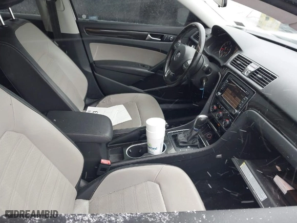 2015 Volkswagen Passat 1.8T SE w/Sunroof & Nav with VIN 1VWBT7A30FC046983, listed as a IAAI auction lot 41627873 with 126,640 mi miles. Bid and sale history available at carsss.com. Image 5.
