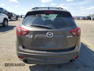 2016 Mazda CX-5 Grand Touring with VIN JM3KE4DY1G0806674, listed as a Copart auction lot 50549465 with 139,753 mi miles and Salvage Title. Bid and sale history available at carsss.com. Image 6.
