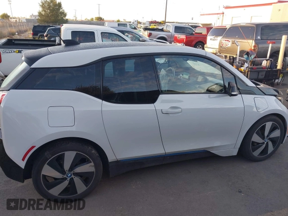 2015 BMW i3 z VIN WBY1Z4C52FV503063, wystawiony jako IAAI lot #40644359 z przebiegiem 77 009 mil mil oraz . Historia ofert i sprzedaży dostępna na DreamBid. Obrazek 13.