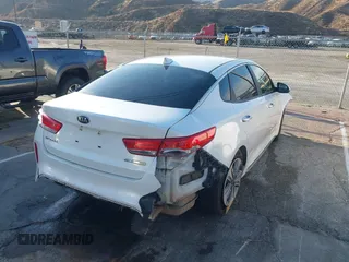 2017 Kia Optima EX z VIN KNAGV4LD5H5017555, wystawiony jako IAAI lot #41414200 z przebiegiem 70 532 mil mil oraz . Historia ofert i sprzedaży dostępna na DreamBid. Obrazek 4.