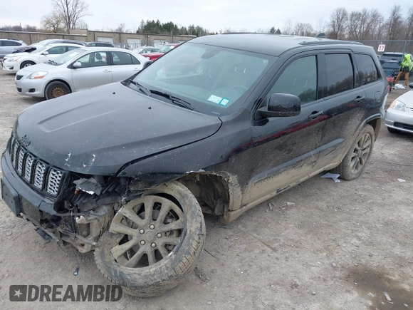 2019 Jeep Grand Cherokee Laredo E with VIN 1C4RJFAGXKC674676, listed as a IAAI auction lot 41942125 with 72,151 mi miles. Bid and sale history available at carsss.com. Image 18.