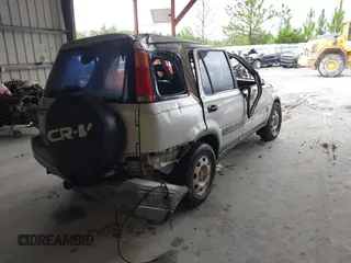 1999 Honda CR-V LX with VIN JHLRD2845XC018679, listed as a IAAI auction lot 39900180 with 222,656 mi miles. Bid and sale history available at carsss.com. Image 4.