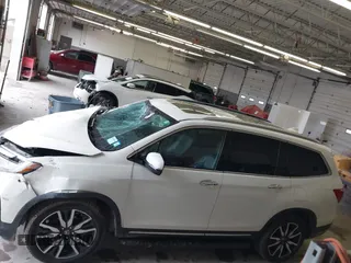 2019 Honda Pilot Elite with VIN 5FNYF6H08KB054725, listed as a IAAI auction lot 40496860 with 91,284 mi miles and . Bid and sale history available at DreamBid. Image 15.