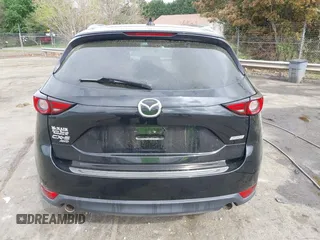 2018 Mazda CX-5 Grand Touring with VIN JM3KFBDM1J0358197, listed as a IAAI auction lot 41967940 with 148,119 mi miles and . Bid and sale history available at DreamBid. Image 16.