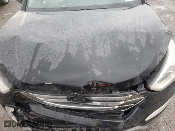2013 Hyundai Santa Fe Sport z VIN 5XYZU3LA5DG112004, wystawiony jako Copart lot #45051395 z przebiegiem 89 831 mil mil oraz Szkoda całkowita • Salvage title. Historia ofert i sprzedaży dostępna na DreamBid. Obrazek 13.