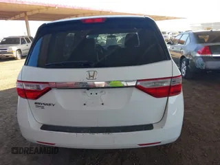 2013 Honda Odyssey LX with VIN 5FNRL5H2XDB028879, listed as a IAAI auction lot 41958988 with 49,868 mi miles and . Bid and sale history available at carsss.com. Image 16.