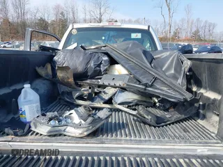 2009 Ford F-150 XL with VIN 1FTRF12W79KA40252, listed as a IAAI auction lot 41803580 with 114,032 mi miles and . Bid and sale history available at DreamBid. Image 12.