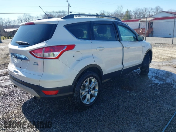 2013 Ford Escape SEL with VIN 1FMCU9HX1DUB37918, listed as a IAAI auction lot 41644931 with 153,726 mi miles and . Bid and sale history available at DreamBid. Image 4.