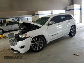 2017 Jeep Grand Cherokee Overland z VIN 1C4RJFCG1HC842890, wystawiony jako Copart lot #63395045 z przebiegiem Nie podano mil oraz Szkoda całkowita • Salvage title. Historia ofert i sprzedaży dostępna na DreamBid. Obrazek 1.