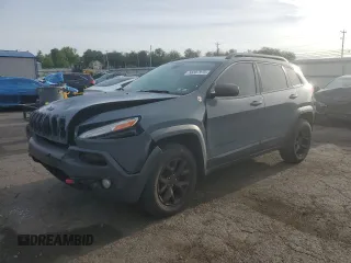 2014 Jeep Cherokee Trailhawk with VIN 1C4PJMBS3EW308706, listed as a Copart auction lot 58307975 with 90,530 mi miles and Salvage title. Bid and sale history available at DreamBid. Image 1.