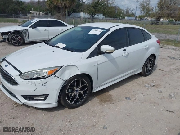 2015 Ford Focus SE with VIN 1FADP3F25FL281314, listed as a IAAI auction lot 41618483 with 110,200 mi miles. Bid and sale history available at carsss.com. Image 2.