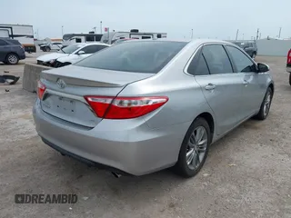 2015 Toyota Camry XLE with VIN 4T1BF1FK1FU036198, listed as a IAAI auction lot 42066857 with 84,619 mi miles. Bid and sale history available at carsss.com. Image 4.
