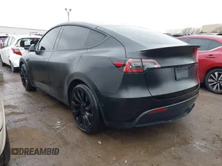 2022 Tesla Model Y Performance z VIN 7SAYGDEF4NF350696, wystawiony jako IAAI lot #41662924 z przebiegiem 36 747 mil mil oraz . Historia ofert i sprzedaży dostępna na DreamBid. Obrazek 3.