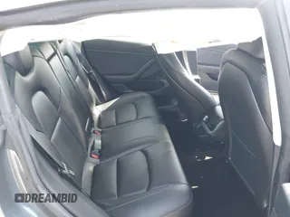 2020 Tesla Model 3 Standard Range Plus z VIN 5YJ3E1EA6LF703159, wystawiony jako IAAI lot #42099718 z przebiegiem 30 175 mil mil oraz . Historia ofert i sprzedaży dostępna na DreamBid. Obrazek 8.