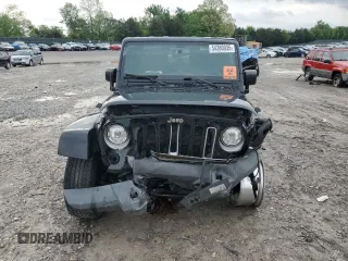 2018 Jeep Wrangler Sahara with VIN 1C4AJWBG2JL852087, listed as a Copart auction lot 54380935 with 49,287 mi miles and Salvage title. Bid and sale history available at DreamBid. Image 5.