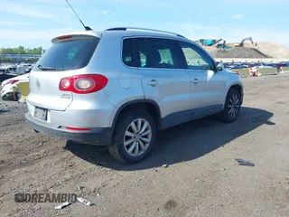 2011 Volkswagen Tiguan SE with VIN WVGBV7AX4BW528845, listed as a IAAI auction lot 42248245 with 224,808 mi miles and . Bid and sale history available at DreamBid. Image 4.