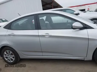 2013 Hyundai Accent GLS z VIN KMHCT4AE3DU548980, wystawiony jako IAAI lot #41562618 z przebiegiem 62 704 mil mil oraz . Historia ofert i sprzedaży dostępna na DreamBid. Obrazek 14.