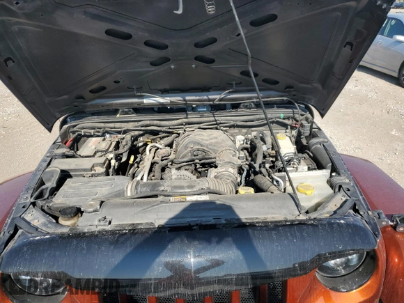 2012 Jeep Wrangler Unlimited Sport with VIN 1C4BJWDG0CL200802, listed as a Copart auction lot 63822365 with 116,501 mi miles and Salvage title. Bid and sale history available at DreamBid. Image 12.