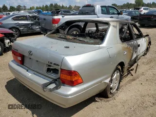 2000 Lexus LS 400 z VIN JT8BH28F2Y0180758, wystawiony jako Copart lot #67166494 z przebiegiem Nie podano mil oraz Nie do naprawy. Historia ofert i sprzedaży dostępna na DreamBid. Obrazek 3.