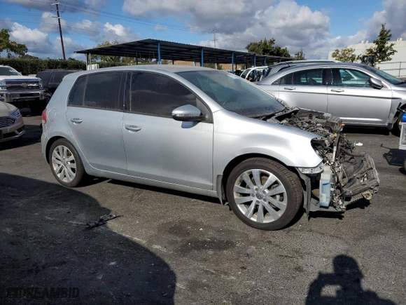 2014 Volkswagen Golf TDI w/Sunroof & Nav with VIN WVWNM7AJ3EW006549, listed as a Copart auction lot 77827474 with 142,904 mi miles and Salvage Title. Bid and sale history available at carsss.com. Image 4.