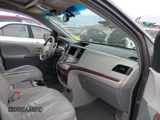 2012 Toyota Sienna XLE AAS with VIN 5TDYK3DC0CS252965, listed as a IAAI auction lot 42059909 with 321,983 mi miles and . Bid and sale history available at carsss.com. Image 5.