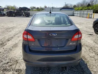 2012 Ford Fiesta SE with VIN 3FADP4BJ7CM157588, listed as a Copart auction lot 52411945 with 124,989 mi miles and Salvage Title. Bid and sale history available at carsss.com. Image 6.