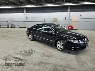 2013 Volkswagen CC Sport z VIN WVWAP7AN3DE517918, wystawiony jako Copart lot #55080285 z przebiegiem 56 408 mil mil oraz Szkody całkowita. Historia ofert i sprzedaży dostępna na DreamBid. Obrazek 13.