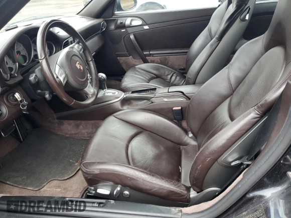 2007 Porsche 911 Turbo z VIN WP0AD29977S785458, wystawiony jako Copart lot #78957064 z przebiegiem 108 780 mil mil oraz Czysty tytuł • Clean title. Historia ofert i sprzedaży dostępna na DreamBid. Obrazek 7.