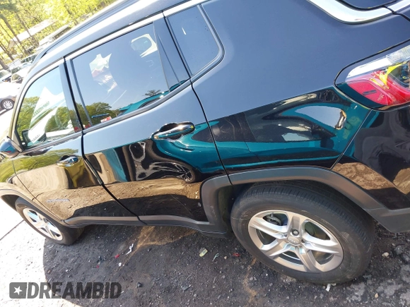 2023 Jeep Compass Latitude with VIN 3C4NJDBN0PT536141, listed as a IAAI auction lot 41974206 with 54,052 mi miles and . Bid and sale history available at DreamBid. Image 14.