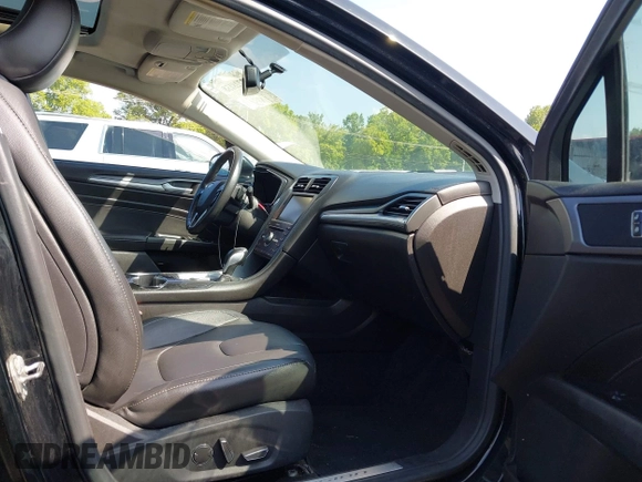 2016 Ford Fusion Titanium with VIN 3FA6P0K90GR333848, listed as a IAAI auction lot 42728138 with 147,864 mi miles and . Bid and sale history available at DreamBid. Image 5.