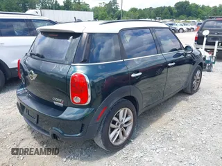 2013 MINI Countryman S z VIN WMWZC3C52DWP20729, wystawiony jako IAAI lot #42388184 z przebiegiem 165 283 mil mil oraz . Historia ofert i sprzedaży dostępna na DreamBid. Obrazek 4.