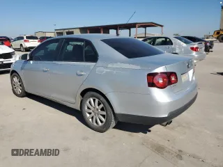 2009 Volkswagen Jetta S z VIN 3VWJM71K79M167562, wystawiony jako Copart lot #80546594 z przebiegiem 196 891 mil mil oraz Szkoda całkowita • Salvage title. Historia ofert i sprzedaży dostępna na DreamBid. Obrazek 2.