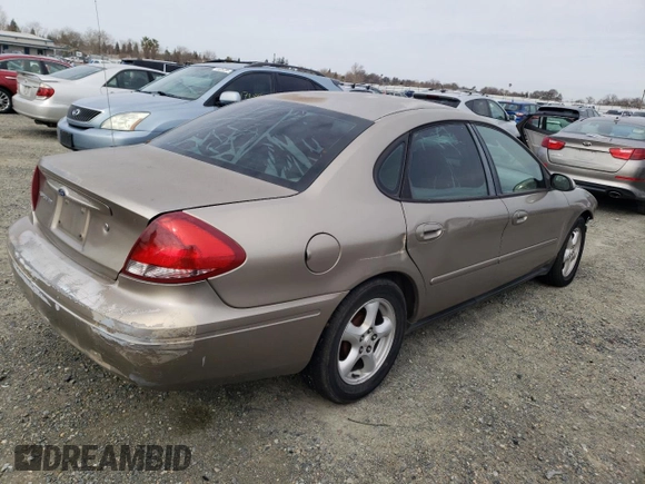 2004 Ford Taurus SE with VIN 1FAFP53U34G129631, listed as a Copart auction lot 45054375 with 182,089 mi miles and Salvage title. Bid and sale history available at DreamBid. Image 3.