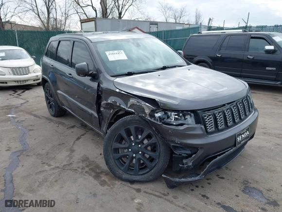 2018 Jeep Grand Cherokee Laredo E with VIN 1C4RJFAG4JC464783, listed as a IAAI auction lot 41664453 with 106,466 mi miles. Bid and sale history available at carsss.com. Image 1.