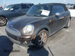 2010 MINI Convertible with VIN WMWMR3C50ATU97550, listed as a IAAI auction lot 41709012 with 86,499 mi miles and . Bid and sale history available at DreamBid. Image 2.