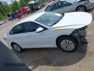 2019 Volkswagen Jetta S z VIN 3VWC57BU7KM243356, wystawiony jako IAAI lot #42334838 z przebiegiem 48 343 mil mil oraz . Historia ofert i sprzedaży dostępna na DreamBid. Obrazek 14.