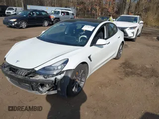 2021 Tesla Model 3 Long Range with VIN 5YJ3E1EB2MF858267, listed as a IAAI auction lot 41782360 with 79,671 mi miles and . Bid and sale history available at DreamBid. Image 20.