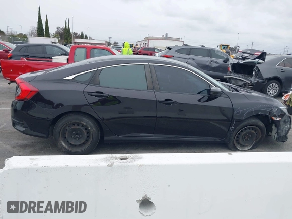 2016 Honda Civic Sedan LX with VIN 2HGFC2F52GH568029, listed as a IAAI auction lot 41735435 with 103,714 mi miles. Bid and sale history available at carsss.com. Image 13.